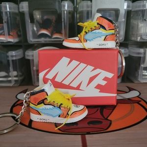 Nike Air Jordan Cartoons Pair of mini sneakers keychain.
